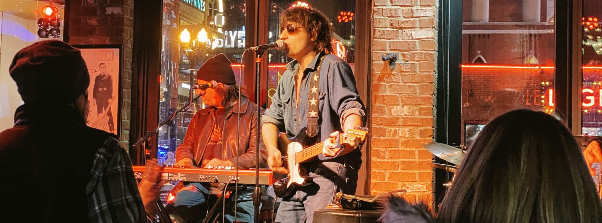 bar singer on guitar in Provo