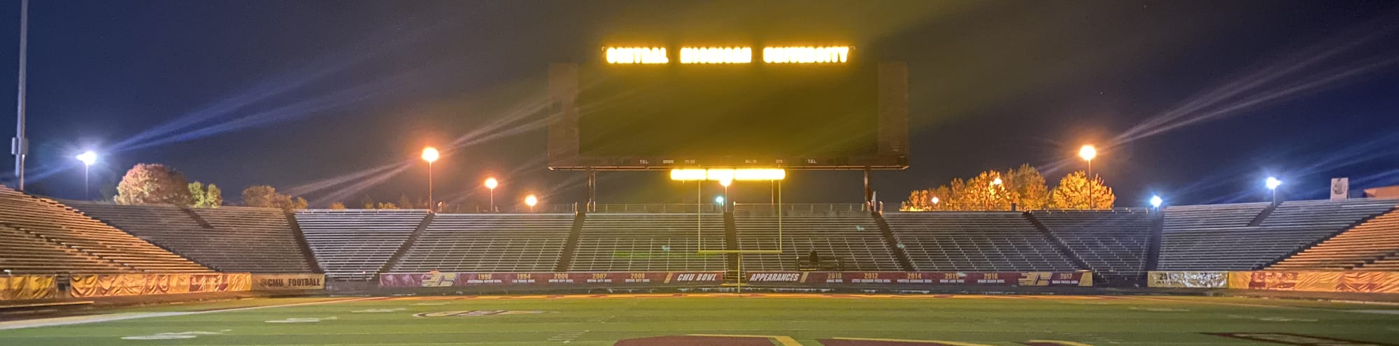 empty football stadium at night under the lights Provo